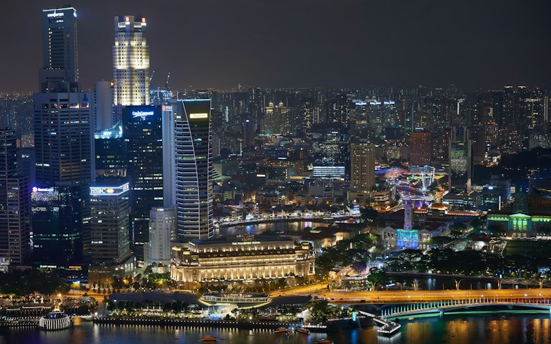 Asian financial centre at night, representing market entry advisory